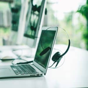 Headset and customer support equipment at call center ready for actively service